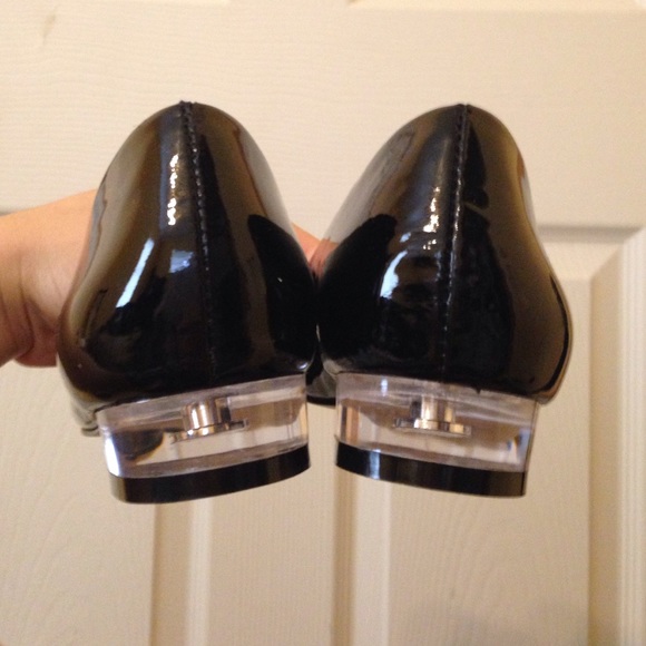 Black flats with lucite heels