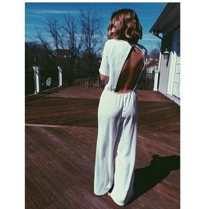 White bcbg open back jumpsuit.