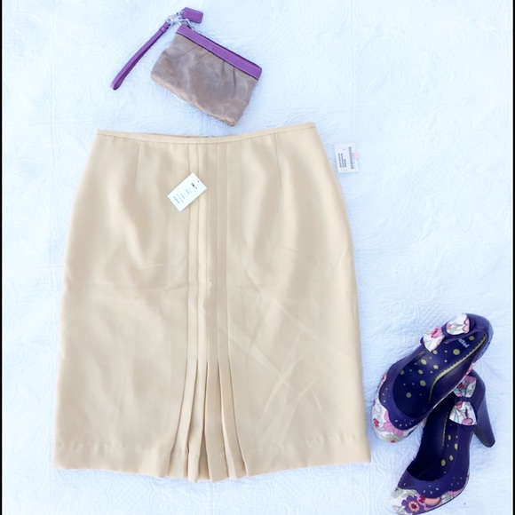 Emily Dresses & Skirts - **SALE** Yellow skirt with pleat detail. NWT
