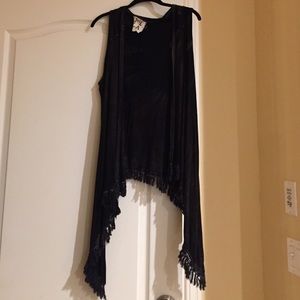 Vest, ruffles at bottom