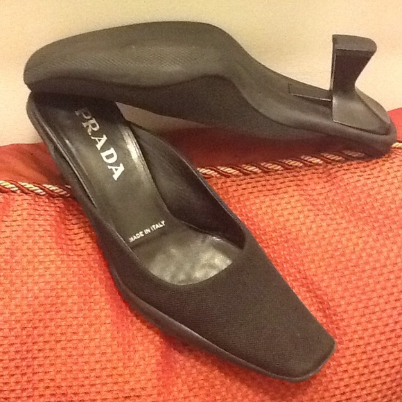 Used pair of Prada sandals. With short heels.