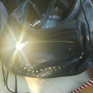 Black purse with golden studs