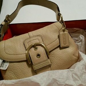 COACH Pebble leather flap purse