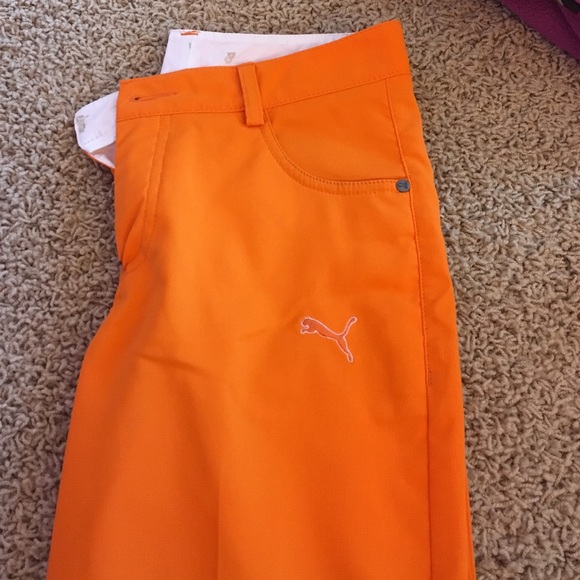 BOYS PUMA GOLF PANTS ORANGE SIZE S NEVER WORN