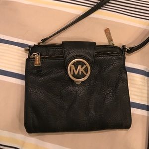 Michael Kors black satchel with built in wallet