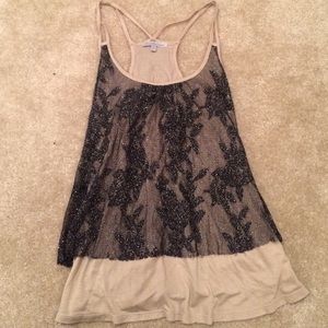 Tan tank with black mess top