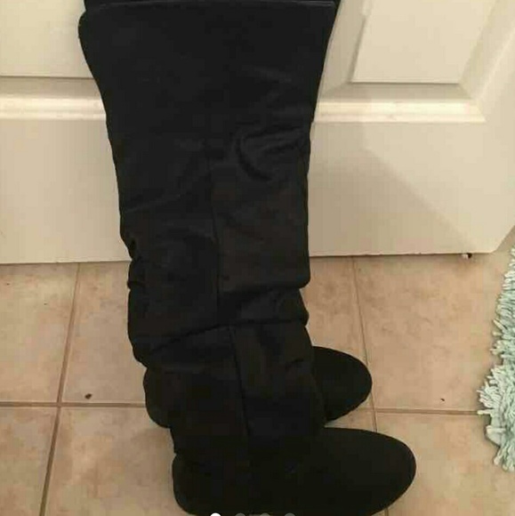 Over the knee flat boot