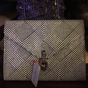 Salvatore Ferragamo hounds tooth portfolio.