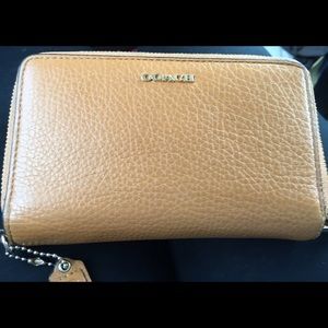 Small coach wallet w/ wrist strap, good condition