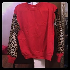 Red crewneck with leopard sleeves!