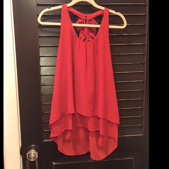 long flowy orange shirt