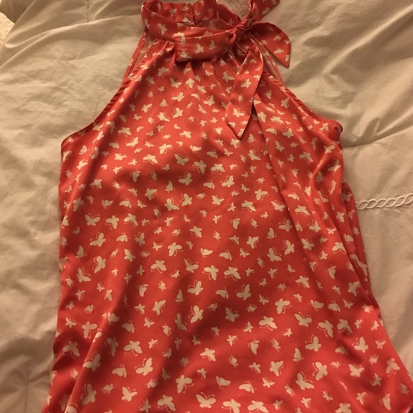 Pretty top! Coral color with white butterflies!