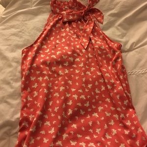 Pretty top! Coral color with white butterflies!