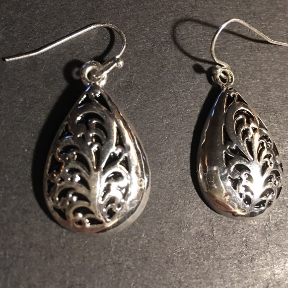 Pierced Earrings Silver tone.