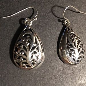 Pierced Earrings Silver tone.