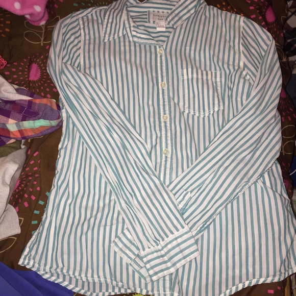 Thin button up blouse.