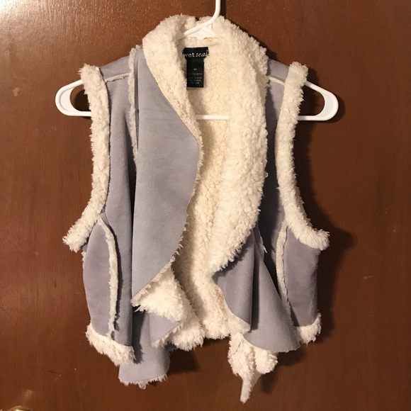 Fur vest. Barely worn, literally like new !