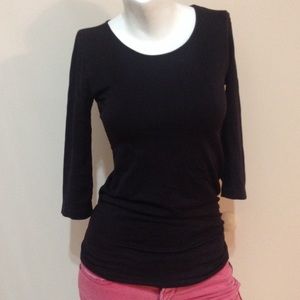 92% nylon 2% spandex. 3/4 length black top.