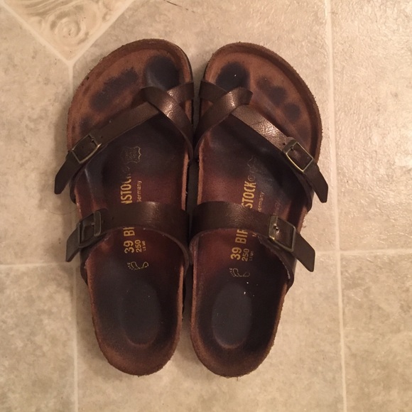 Three strapped Birkenstocks