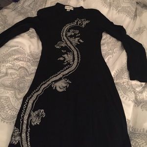 Blk tight mesh dragon dress by Bebe. Size P