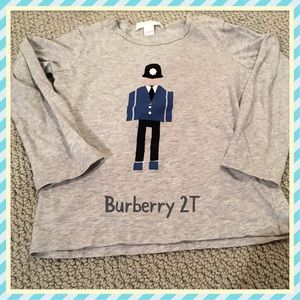 Burberry top. Is a 3T but runs small. Worn 1 time