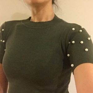 Green top with pearls on sleeves