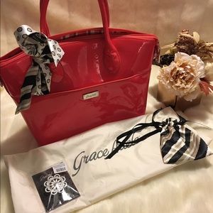 Grace Adele Coral Patent Purse