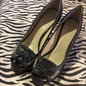 Nine West peep toe Navy heels. So cute and fun