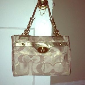 Gold coach bag