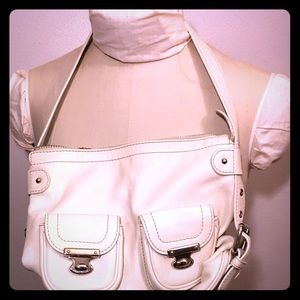 Marc Jacobs white purse.