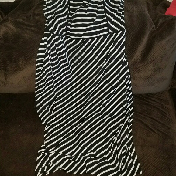 Women's strapless calf length dress.