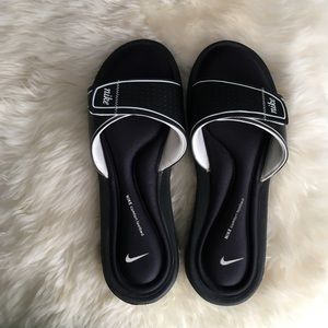 Black Nike slides