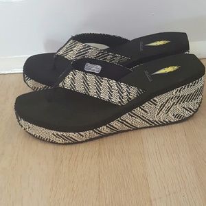 Black and tan wedge sandals