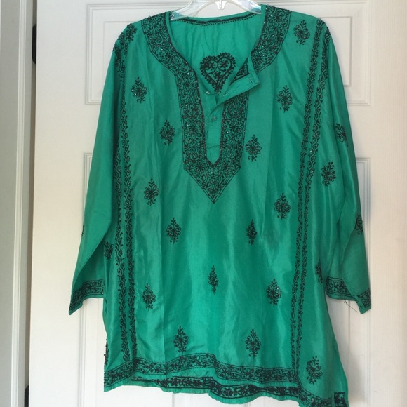 Never worn green/ black tunic. Size XL?