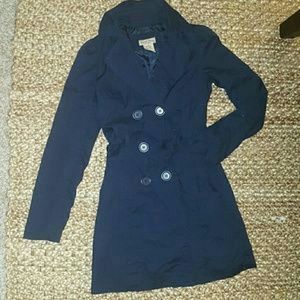 Blue double-breastes trench coat with tie
