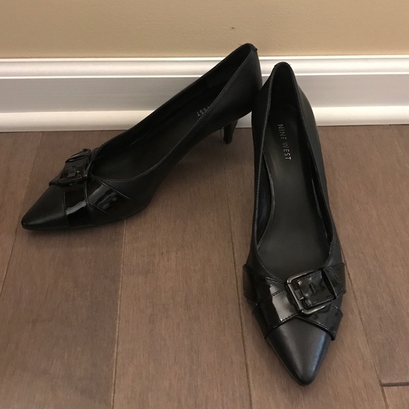 Nine West black 1 1/2 inch heel pump.  Size 8