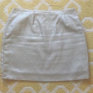 Silver mini skirt with hints of gold thread