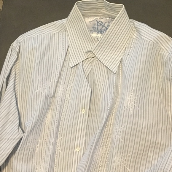 Long sleeve Buckle button down shirt.