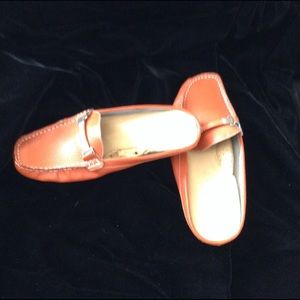 Trivica orange leather driving flats