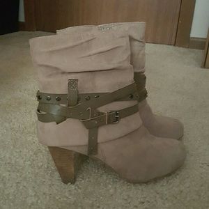 Heeled strappy booties.