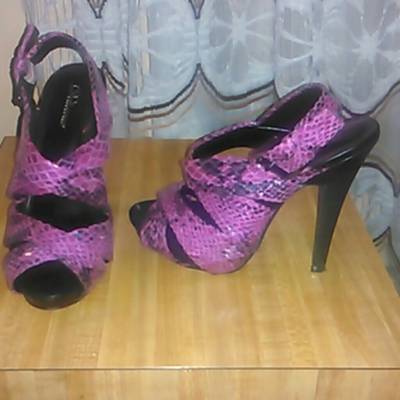 Pink snakeskin platform heels