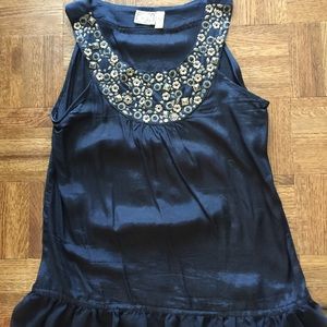 Black silky sleeveless top with ruffle