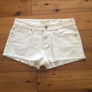 White cutoff shorts