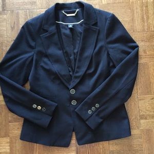 Black suit jacket. Hits at waist