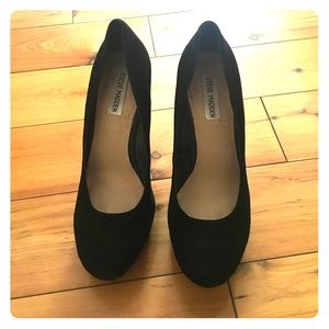Black suede pumps