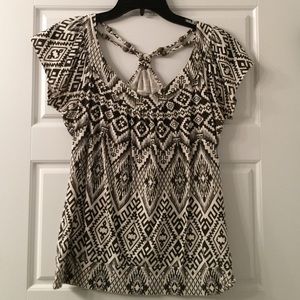 Tribal tee with decorative back