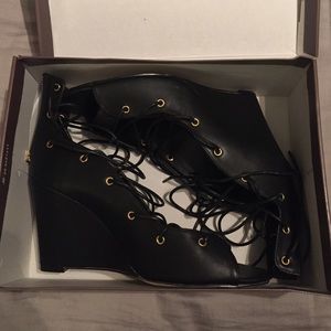 Never worn Leila Stone lace up wedge heels