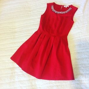 Great red cocktail dress with detail at top. NWOT
