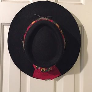 Black Wool felt hat with 3 Conchos and red band.
