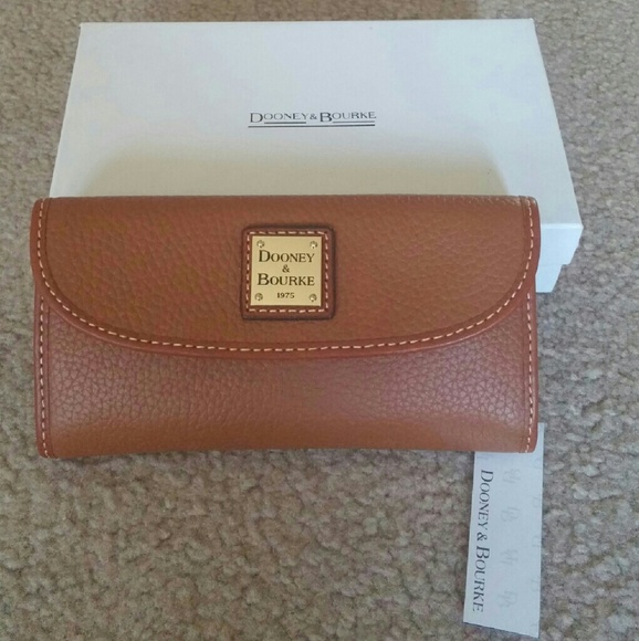 Dooney and bourke caramel colored wallet. New